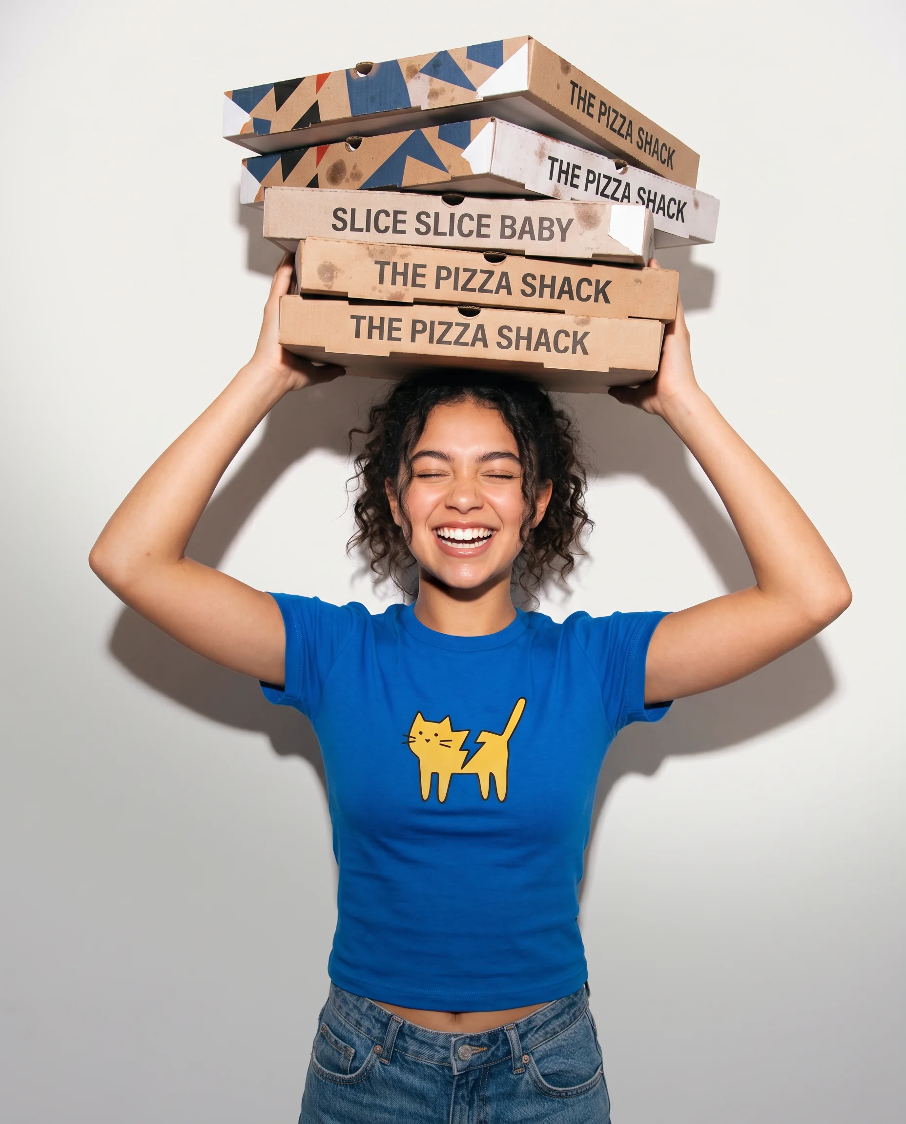 Student carrying local pizza boxes